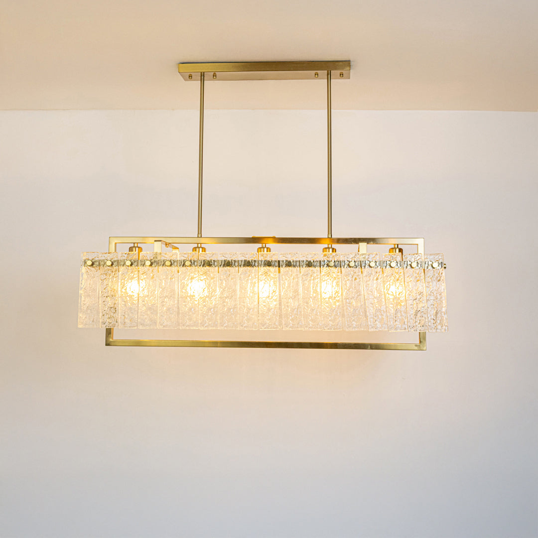 Gold metal crystal chandelier with sparkling glass detailing creating elegant modern ceiling lighting for upscale interiors.
