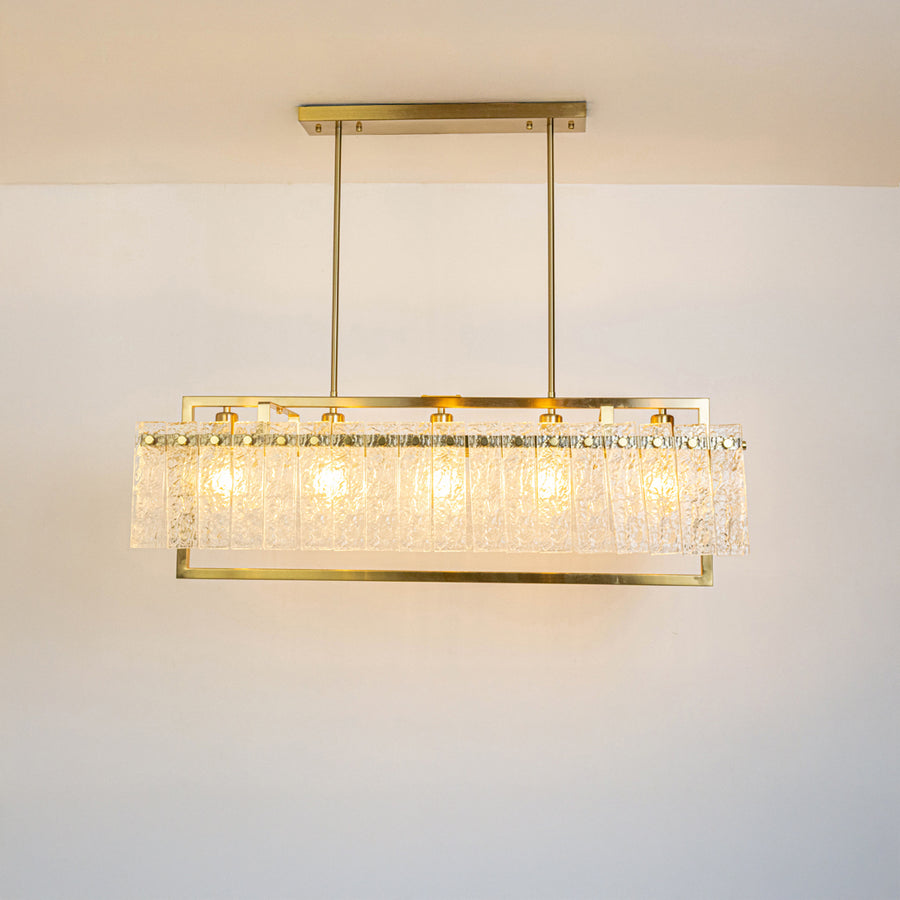 Gold metal crystal chandelier with sparkling glass detailing creating elegant modern ceiling lighting for upscale interiors.