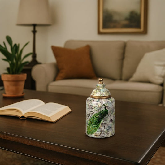 Decorative ceramic jar with hand painted design placed on wooden coffee table adding artistic charm and elegant accent to living room decor.