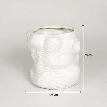 White ceramic sculpted decorative vase measuring 28 cm height and 29 cm width ideal for modern home decor placement.