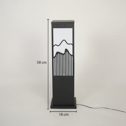Modern outdoor bollard light with black metal frame and mountain pattern diffuser on neutral background 58 cm height 18 cm width ideal for garden pathway lighting.