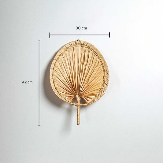 Natural woven palm leaf hand fan 42cm height 30cm width dimension image showing tropical bohemian handcrafted wall decor.