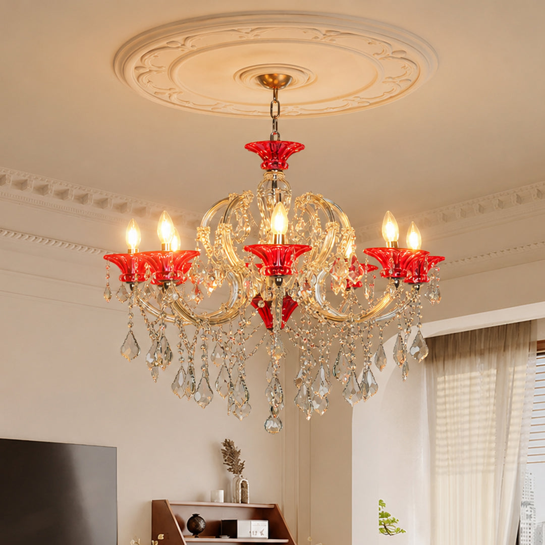 Lifestyle image of red and clear glass baccarat style chandelier for luxury dining room decor styling with elegant detailing.