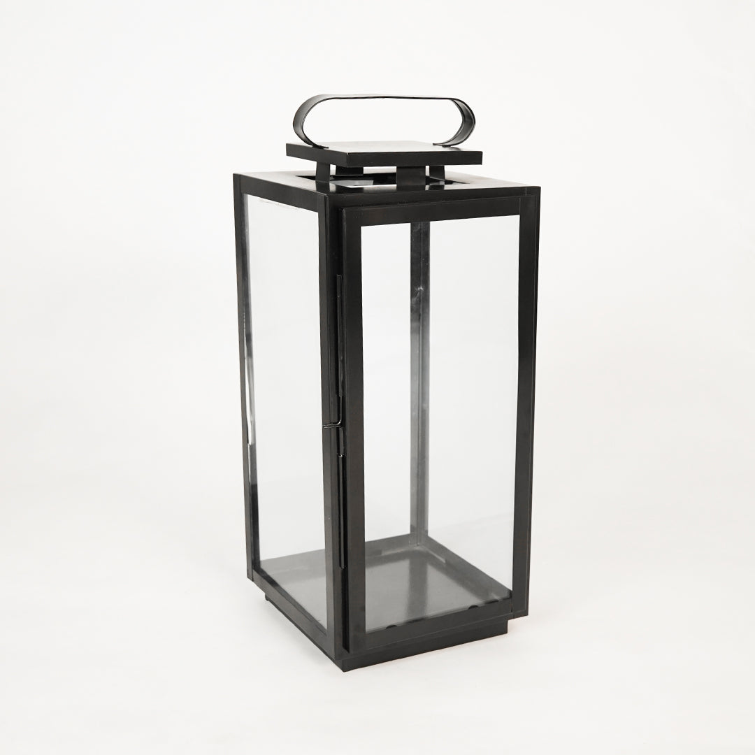 White background image of large metal tower lantern for elegant outdoor decor styling with classic vintage lighting design.