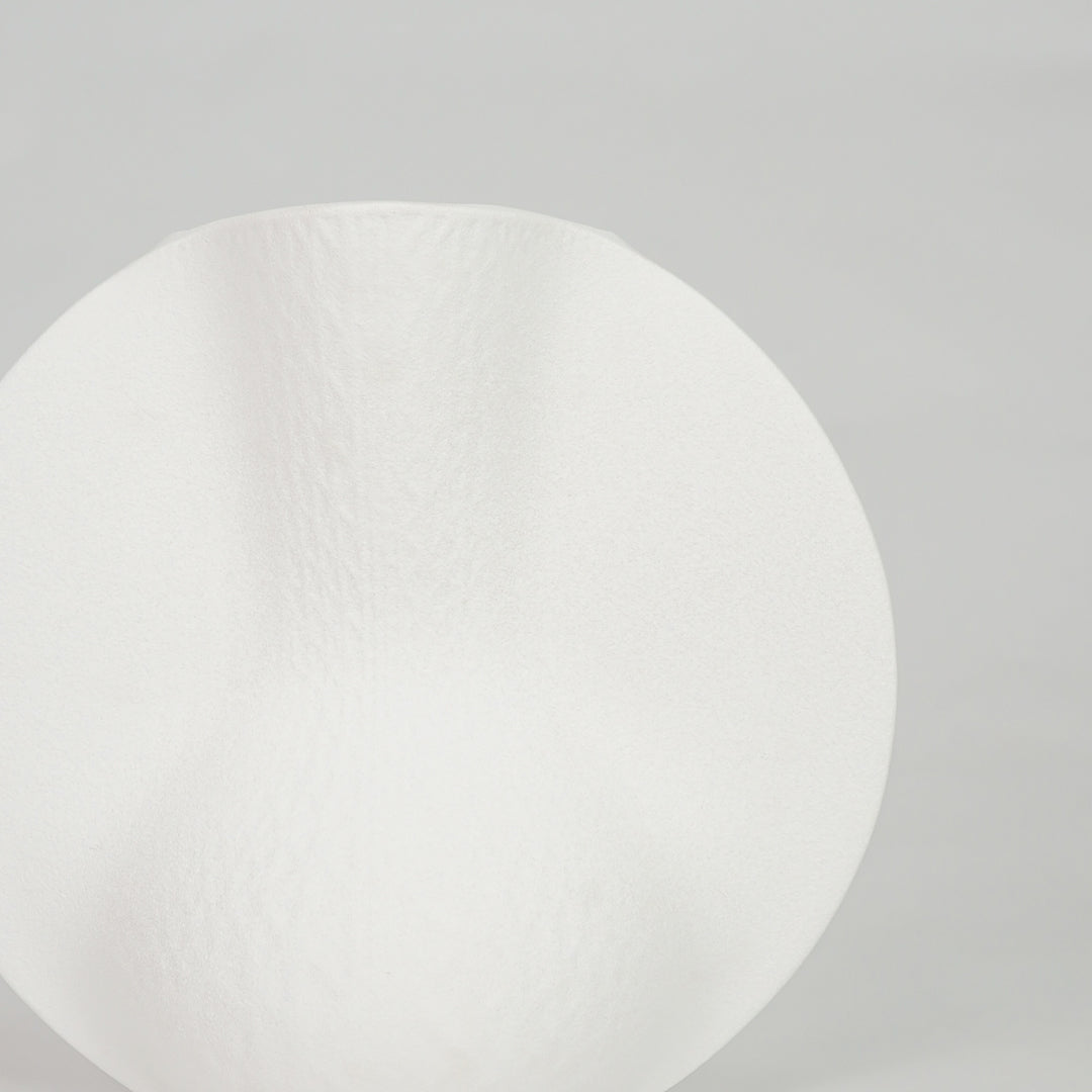 Closeup image of white ceramic modern vase for elegant tabletop decor styling with smooth matte finish display.