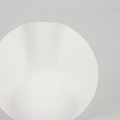 Closeup image of white ceramic modern vase for elegant tabletop decor styling with smooth matte finish display.