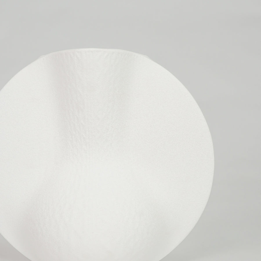 Closeup image of white ceramic modern vase for elegant tabletop decor styling with smooth matte finish display.