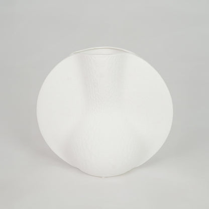White background image of white ceramic decor plate for modern dining table styling with matte finish.