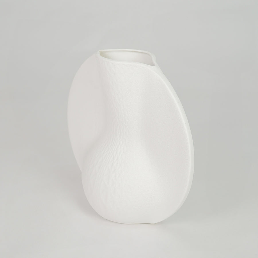 White background image of white ceramic abstract vase for modern tabletop decor styling with matte finish.