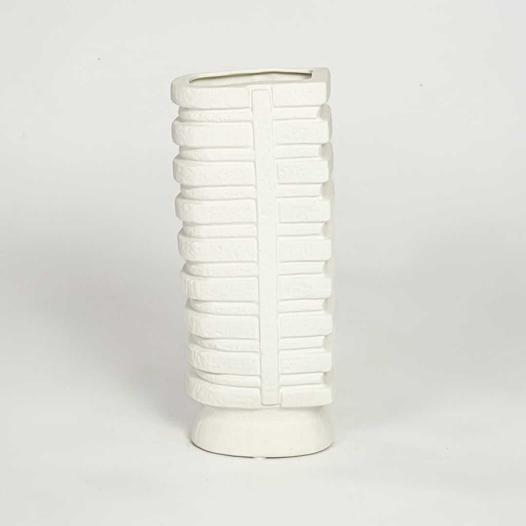 White textured tall ceramic vase on white background modern decorative floor vase for living room shelf styling.