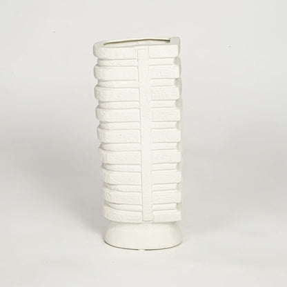 White textured tall ceramic vase on white background modern decorative floor vase for living room shelf styling.