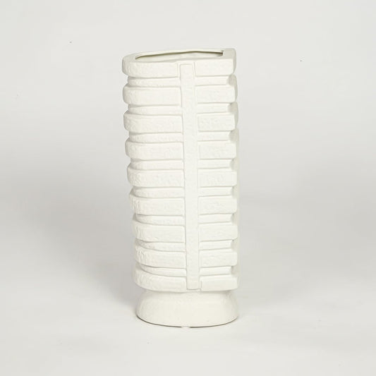 White textured tall ceramic vase on white background modern decorative floor vase for living room shelf styling.