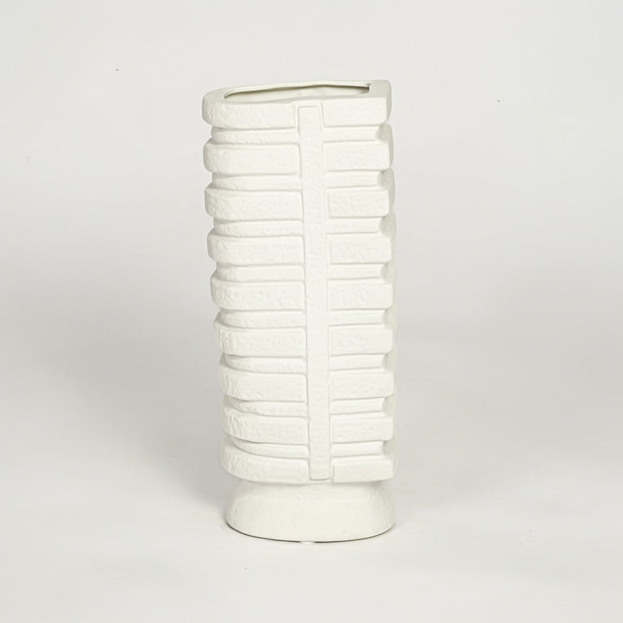 White textured tall ceramic vase on white background modern decorative floor vase for living room shelf styling.