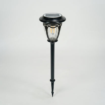Modern black metal solar pathway light for garden lawn walkway and outdoor lighting on white background image.