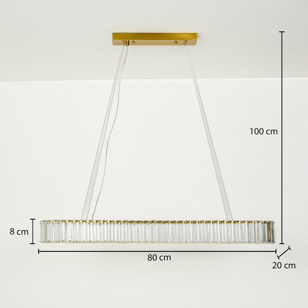 Gold rectangular crystal chandelier with metal frame and glass rods suspended on white ceiling background 80 cm length 20 cm width 8 cm height with 100 cm adjustable hanging.