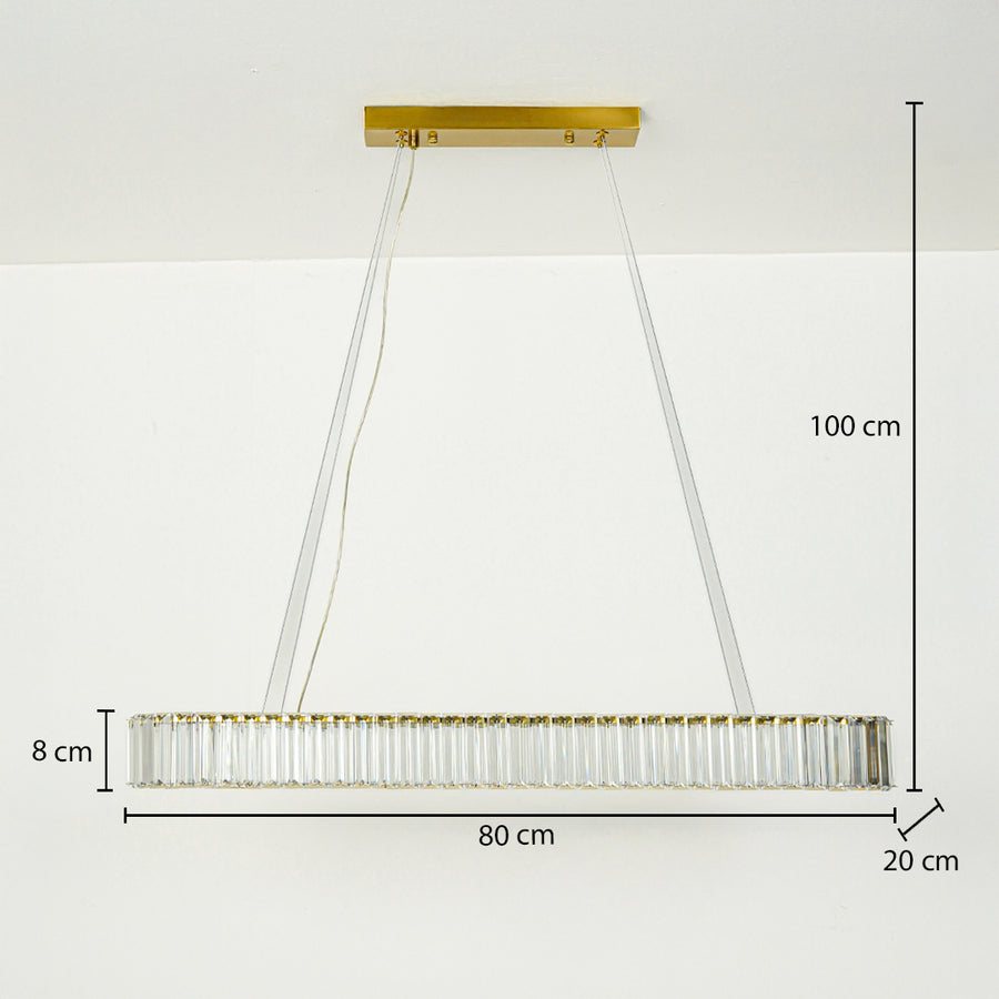 Gold rectangular crystal chandelier with metal frame and glass rods suspended on white ceiling background 80 cm length 20 cm width 8 cm height with 100 cm adjustable hanging.