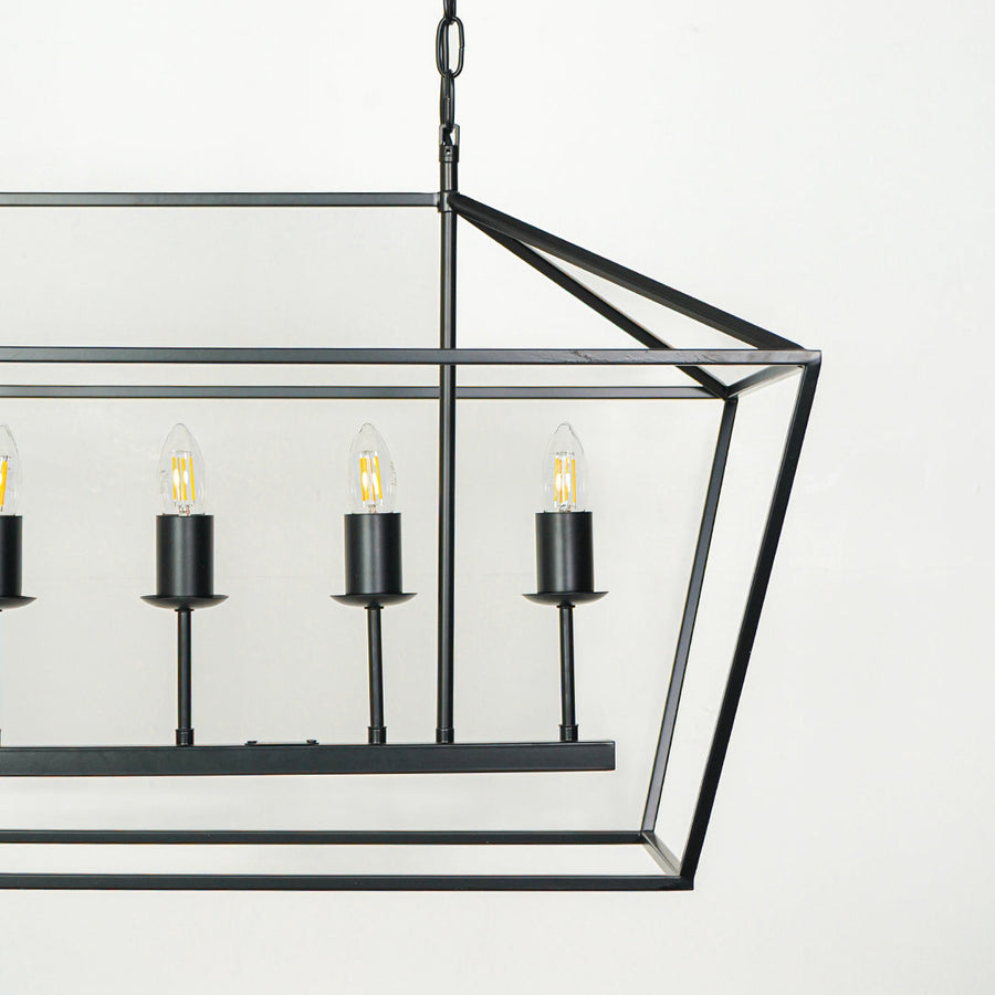 Stylish rectangular metal cage chandelier with multiple bulbs suspended by rods against white wall background ideal for industrial interior lighting.

