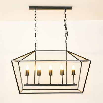Contemporary black metal linear pendant light with exposed bulbs in geometric cage design hanging against neutral wall background for modern decor.