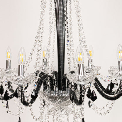 Closeup of tall black and clear crystal chandelier with fine detailing perfect for luxury interior ceiling lighting.