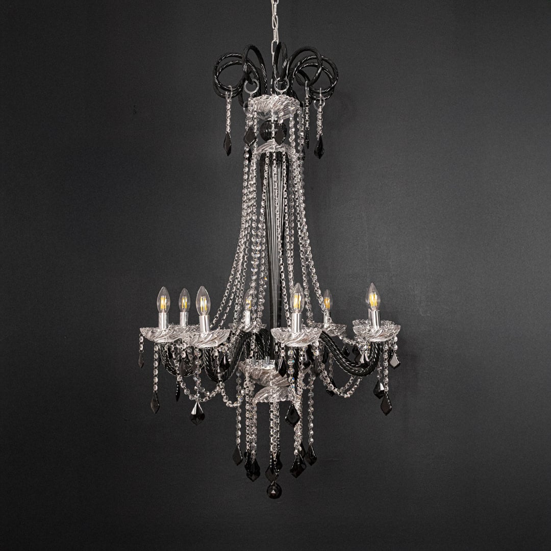 Tall black and clear crystal chandelier shown on black background highlighting its premium grand ceiling design.