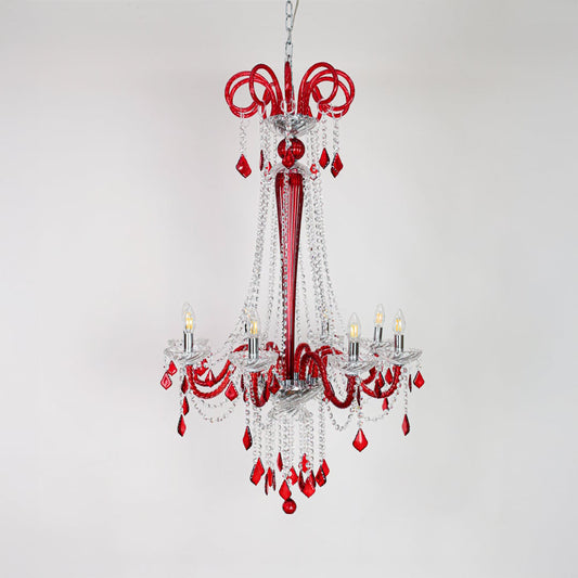 Red and clear crystal chandelier displayed on white background ideal for vibrant elegant interior ceilings.