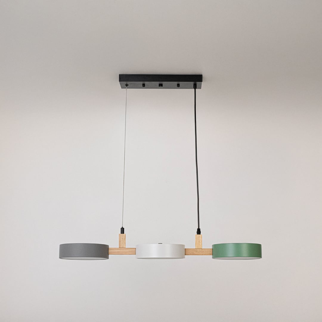 Black and gold metal linear pendant light with minimalist styling for contemporary home decor spaces.