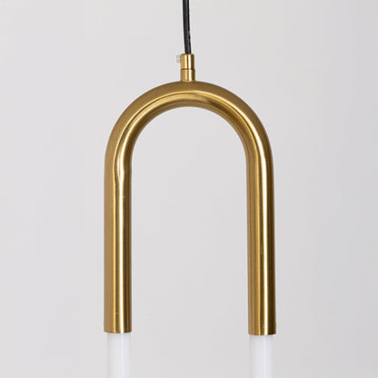 Closeup of gold U shaped pendant light with sleek metal finish highlighting modern craftsmanship and premium LED lighting design.