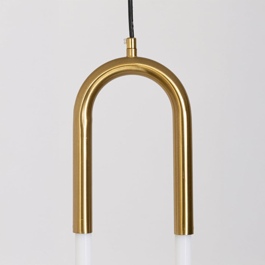 Closeup of gold U shaped pendant light with sleek metal finish highlighting modern craftsmanship and premium LED lighting design.