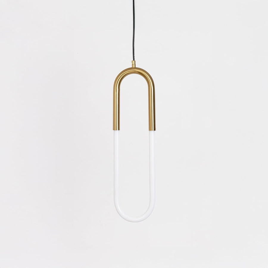 Minimalist gold pendant light with U shaped LED tube switched off displayed on plain white background for stylish catalog display.