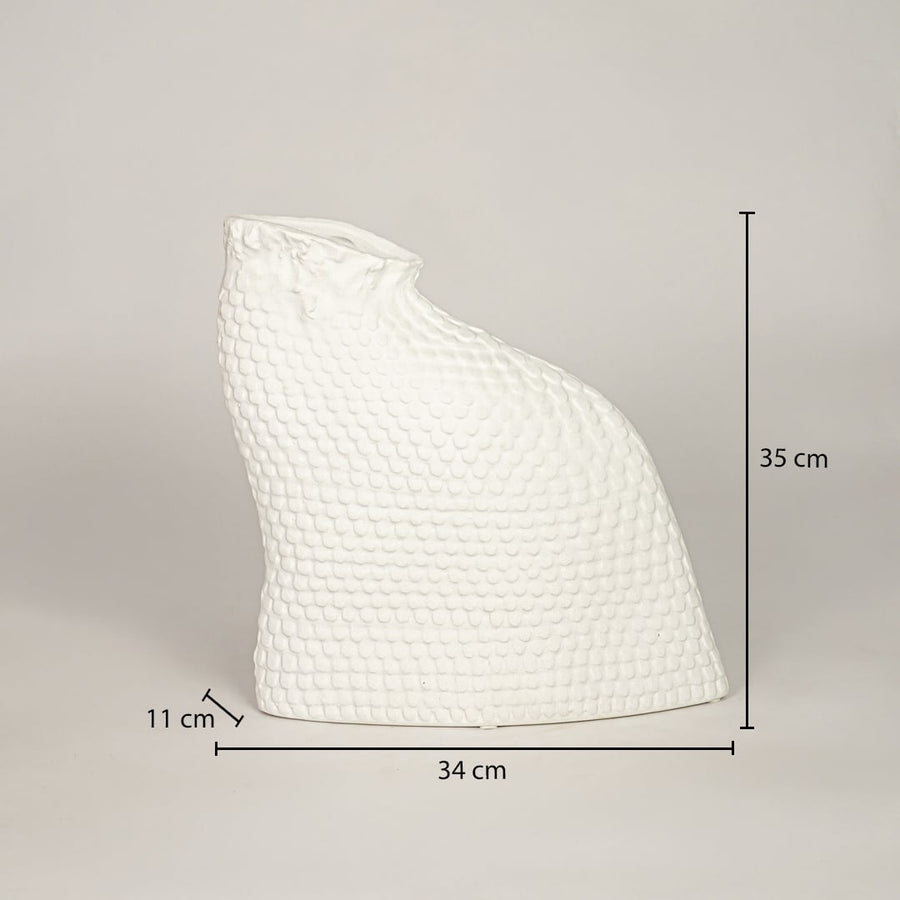 Dimension image of matte white ceramic art vase featuring a textured scaled surface and organic shape showing 35 cm height and 34 cm width.