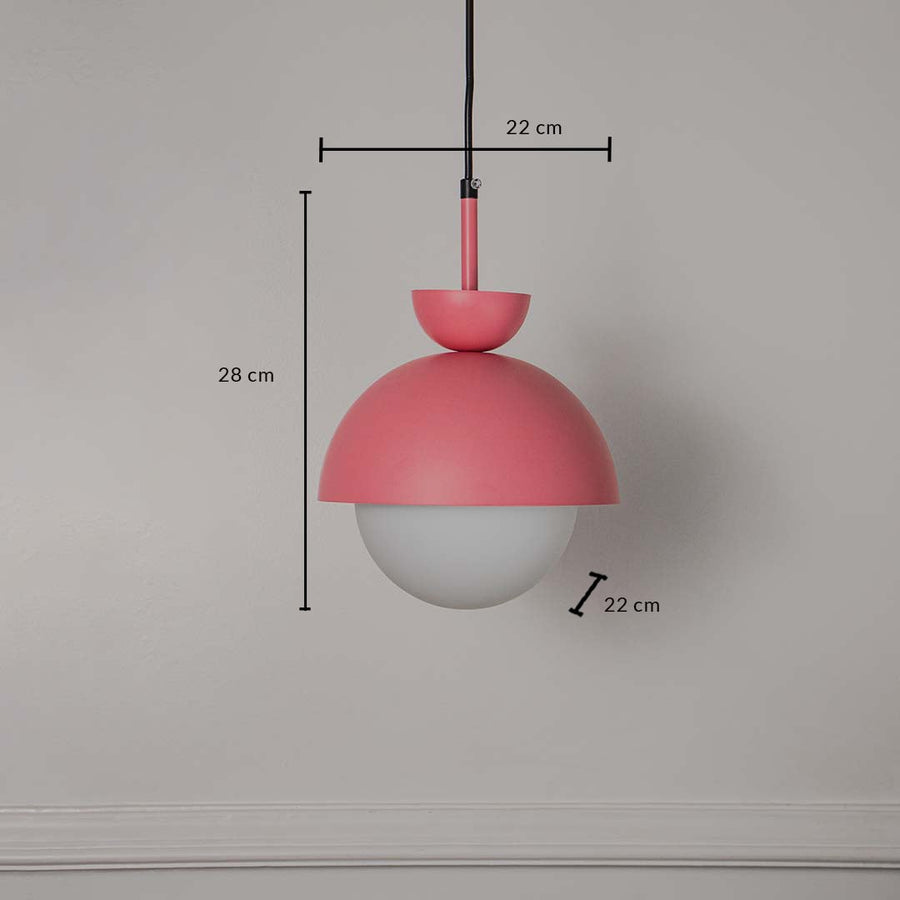 Pendant light with matte pink metal body and frosted glass globe shade 22 cm width and 28 cm height for stylish interiors.