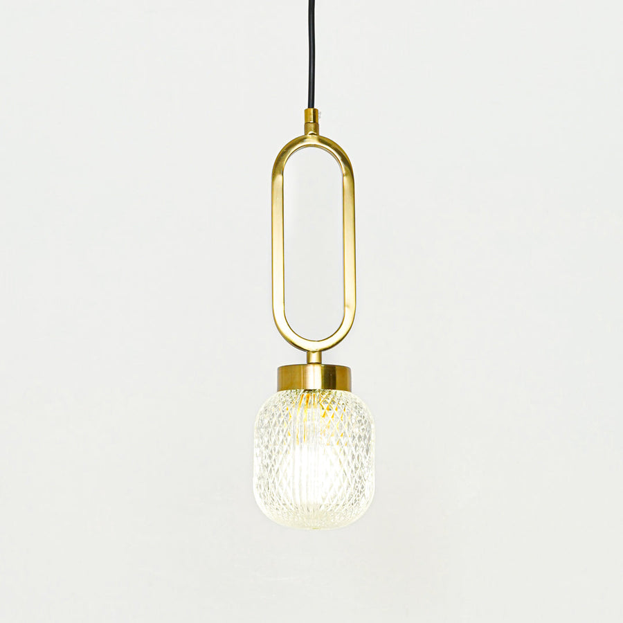 Textured clear glass and gold metal pendant light designed for elegant modern home decor spaces.