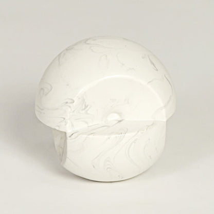 Modern white marble look ceramic statement decor piece with organic rounded silhouette for contemporary interiors.