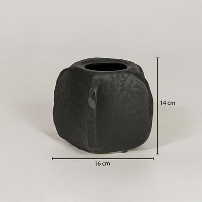 Black ceramic planter measuring 14 cm height and 16 cm width for modern tabletop decor styling placement.