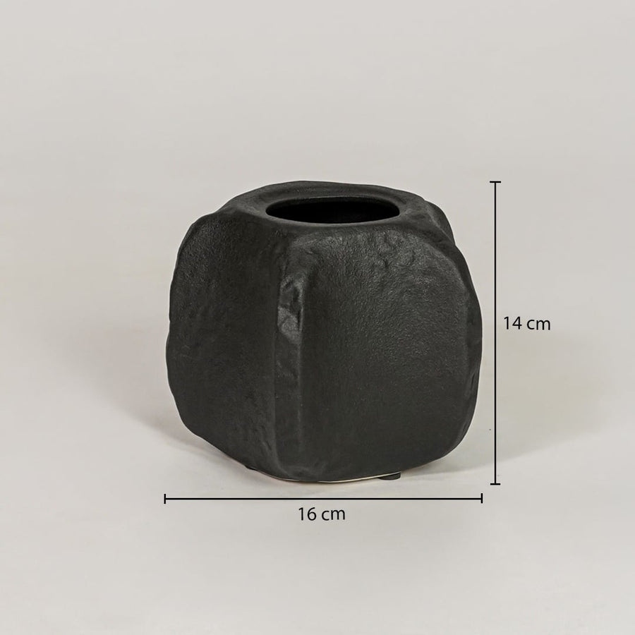 Black ceramic planter measuring 14 cm height and 16 cm width for modern tabletop decor styling placement.