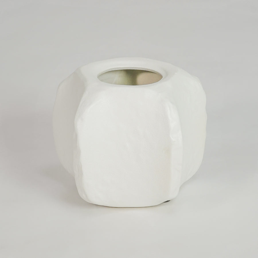 White background image of small white ceramic vase with lid for elegant tabletop decor styling and modern interior design.