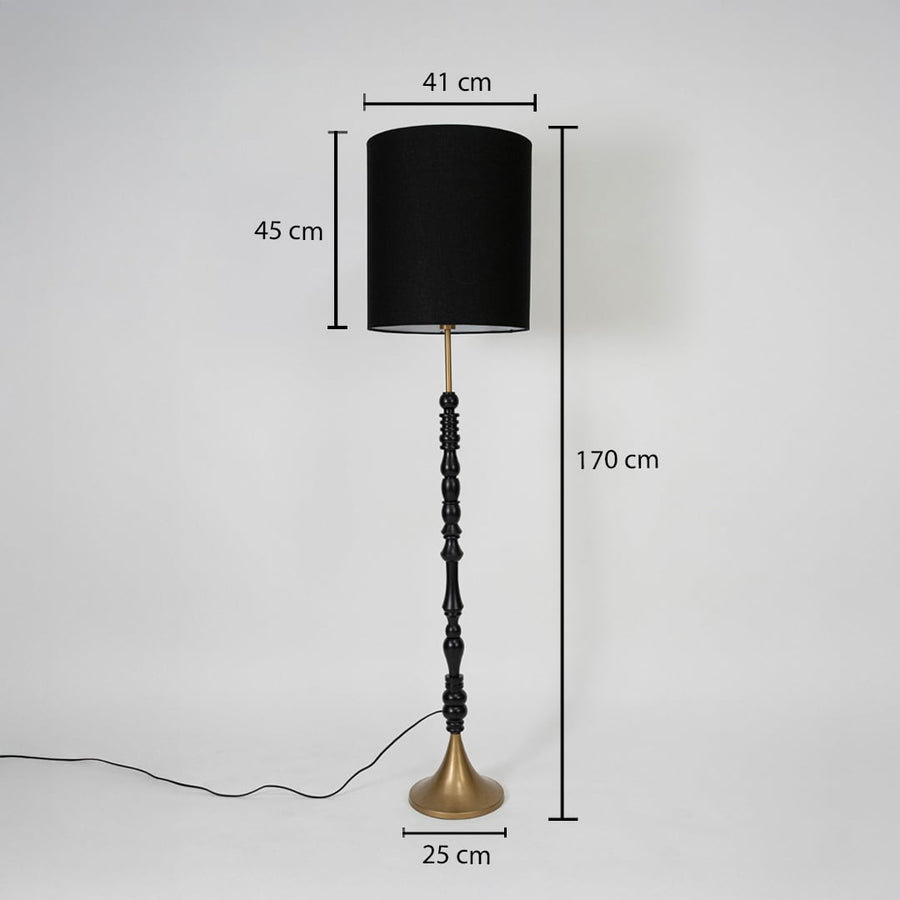 Black fabric shade floor lamp with turned wood stem and brass base measuring 170 cm tall for elegant interior lighting.