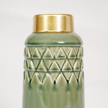 Closeup image of olive grey green gold ceramic vase for elegant tabletop decor styling highlighting modern smooth finish.