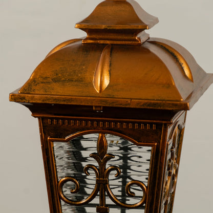 A closeup shot of the lantern without illumination showing the ornate metal frame textured glass panels and detailed craftsmanship in a clear view.