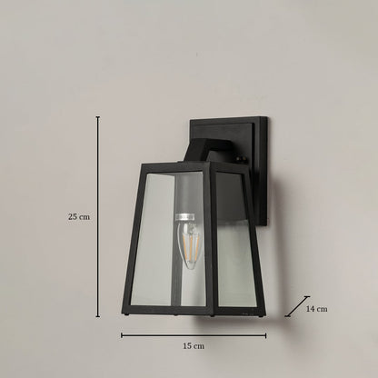 Black outdoor wall lantern measuring 25 cm height 15 cm width and 14 cm depth with clear glass panels and metal frame.