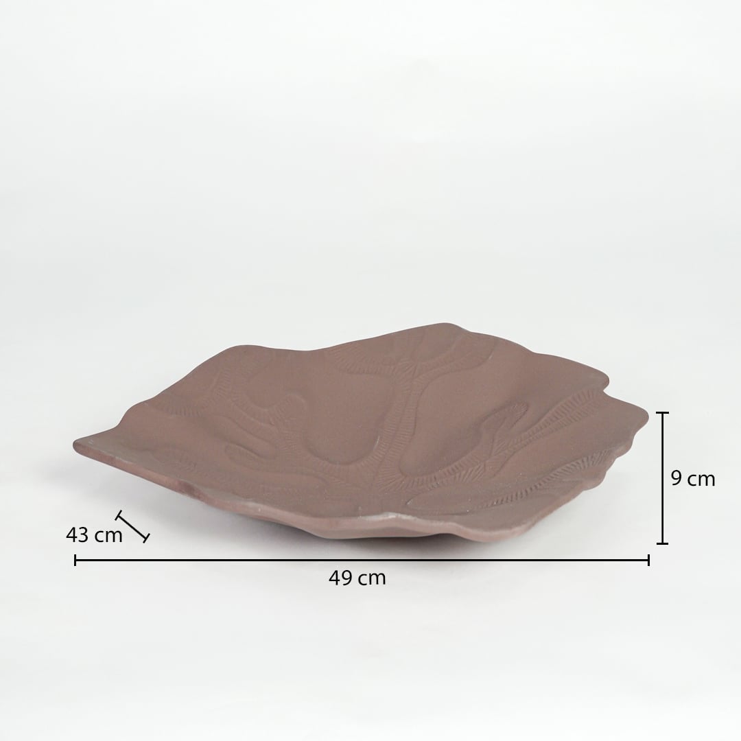 Brown ceramic decorative platter measuring 49 cm length 43 cm width and 9 cm height ideal for table styling.