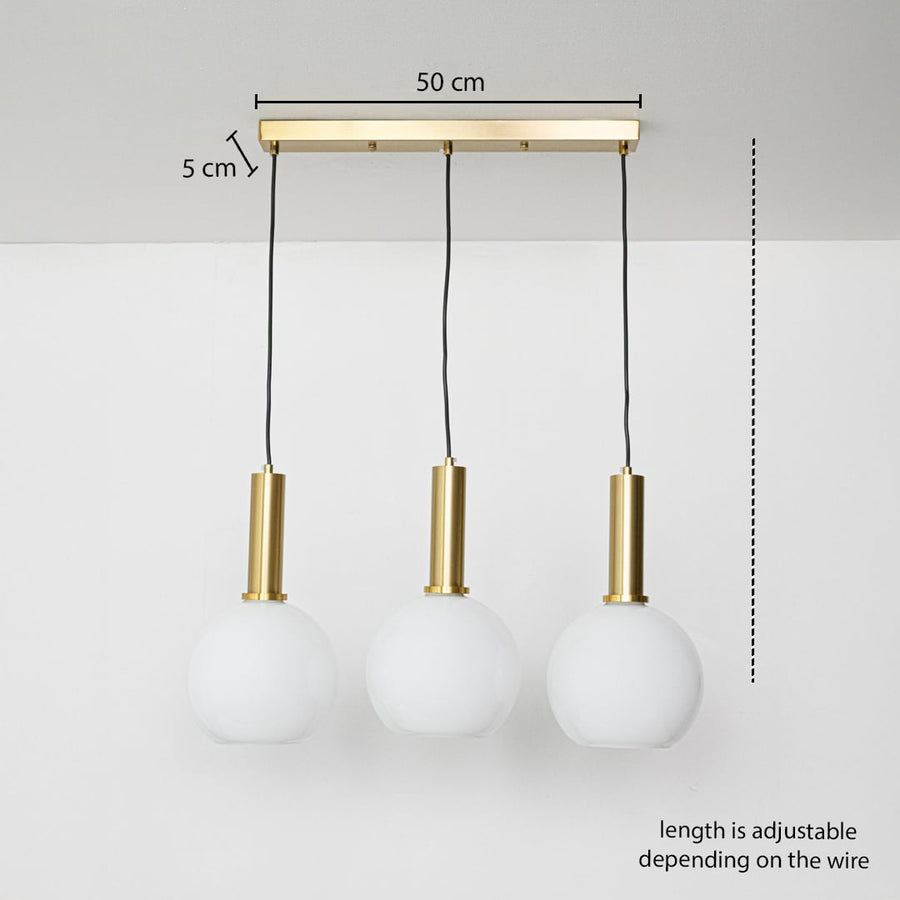 Adjustable white globe pendant light set with gold metal holders shown with a clear hanging height guide for accurate lighting display.