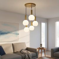 White glass and gold metal pendant lights adding warm elegance to contemporary bedroom interiors.