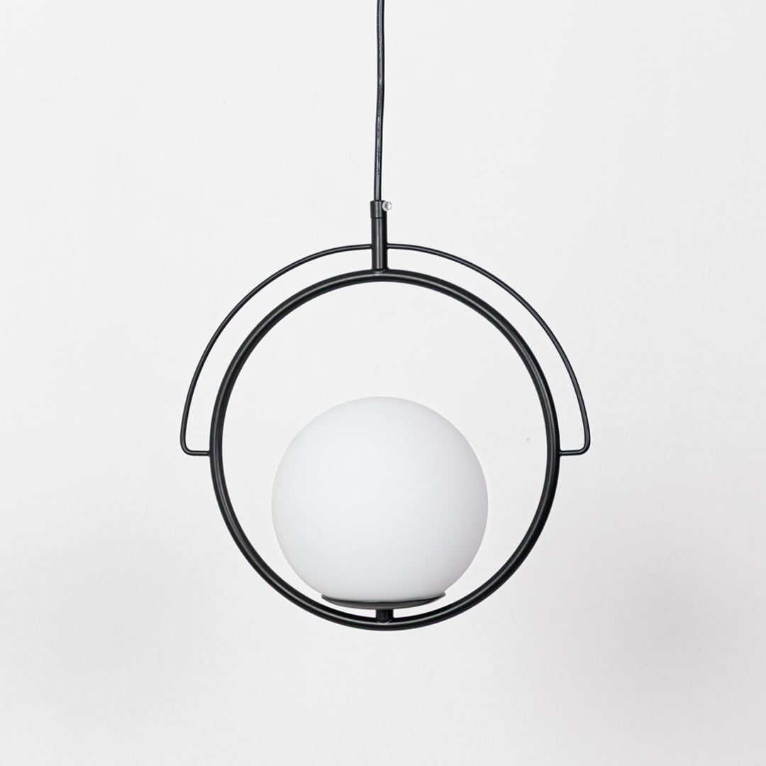 Black metal and white glass ring pendant light designed for contemporary home decor spaces.