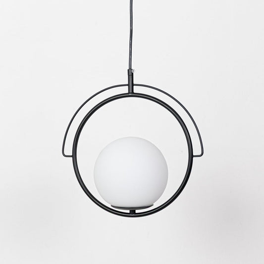 Black circular pendant light with round white globe shade shown with lights off displaying its matte frame and balanced modern shape against a white backdrop.