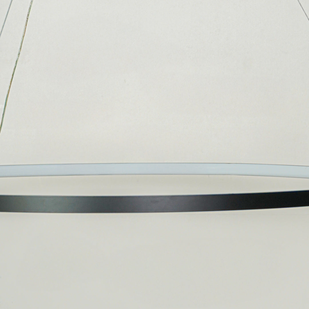 Contemporary sleek linear hanging light with black finish displayed against soft white ceiling background perfect for modern interior decor lighting.