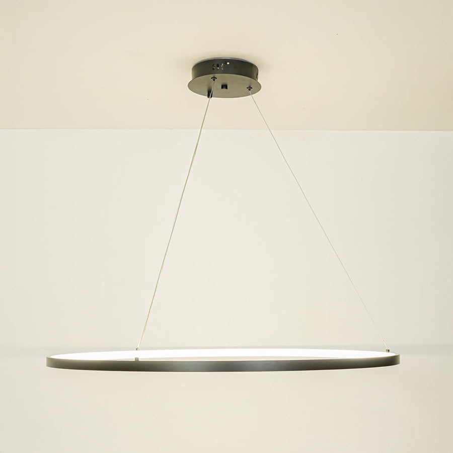 Minimal black linear pendant light with sleek design suspended by thin cables against white ceiling background perfect for modern interiors.