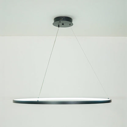 Elegant modern linear pendant light with slim profile hanging against neutral ceiling background ideal for contemporary dining or kitchen lighting.

