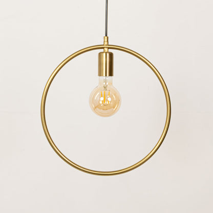 Gold metal ring pendant light with exposed bulb designed for elegant dining room decor spaces.