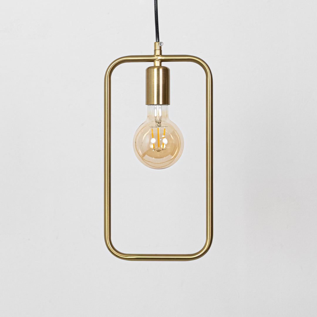 Amber glass and gold metal pendant light with rectangular frame for modern dining room decor.